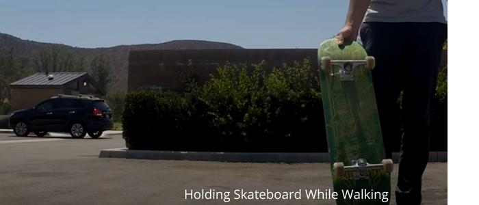 5 Cool Ways to Hold a Skateboard While Walking!